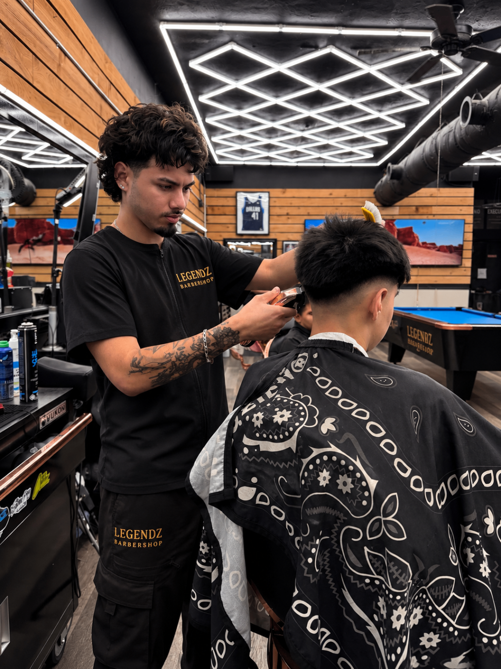 Barber at The Original Legendz Barbershop Lounge 2