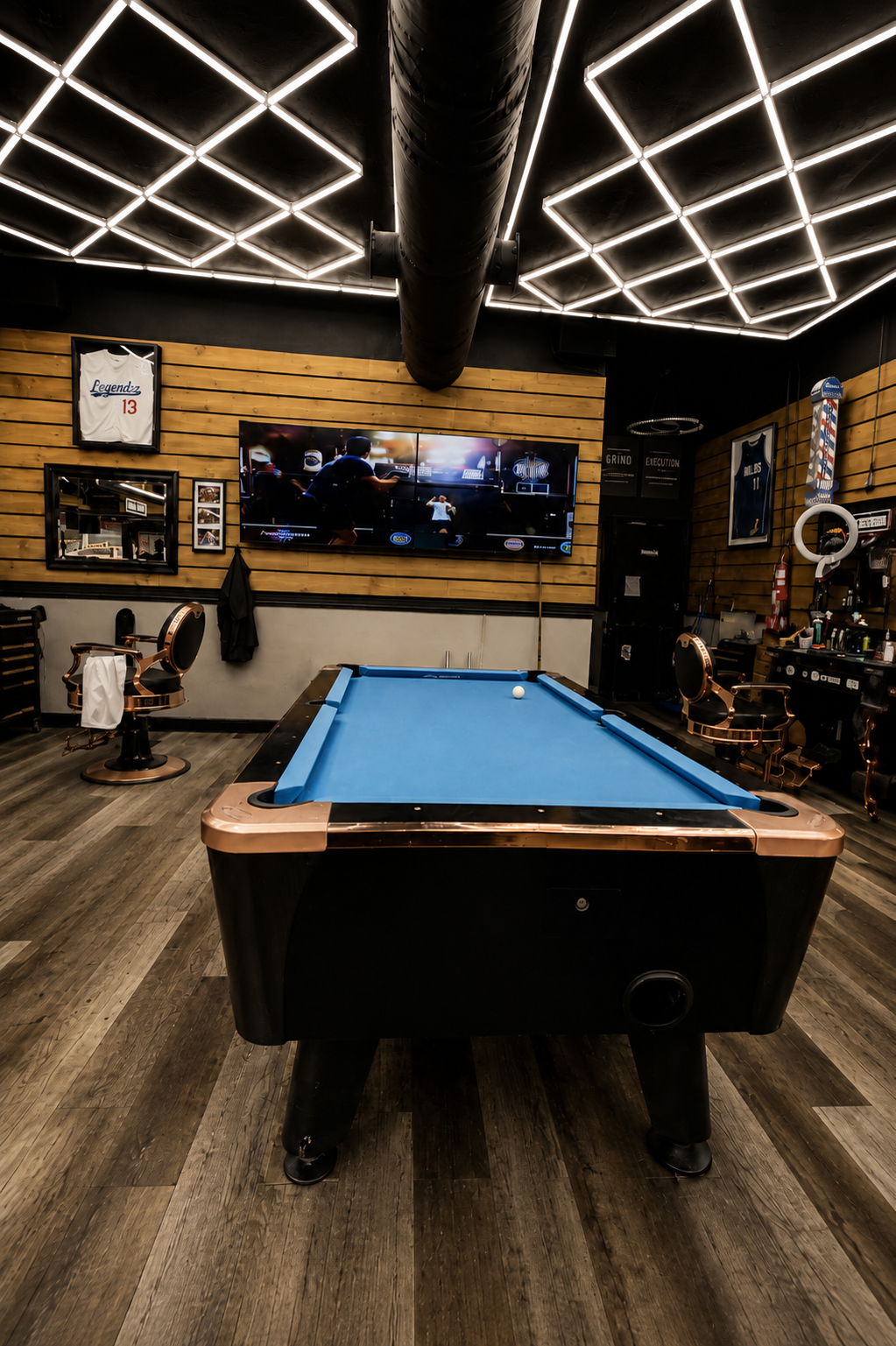 Pool table at The Original Legendz Barbershop Lounge
